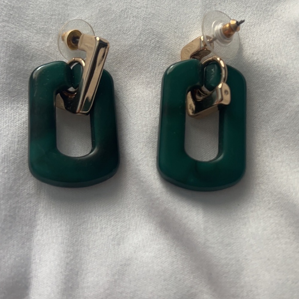 Green dangling earrings!